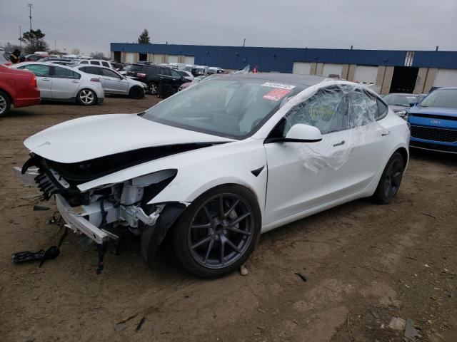 TESLA MODEL 3 2022 with VIN 5YJ3E1EA4NF338466 - Photo from auction