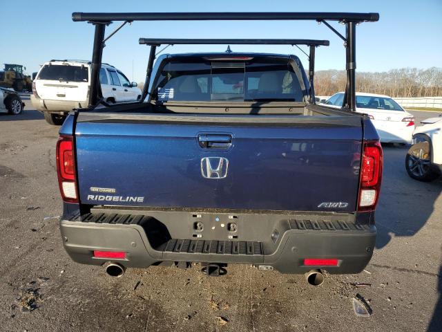 Photo 6 from auction – 2022 HONDA RIDGELINE with VIN 5FPYK3F70NB009638