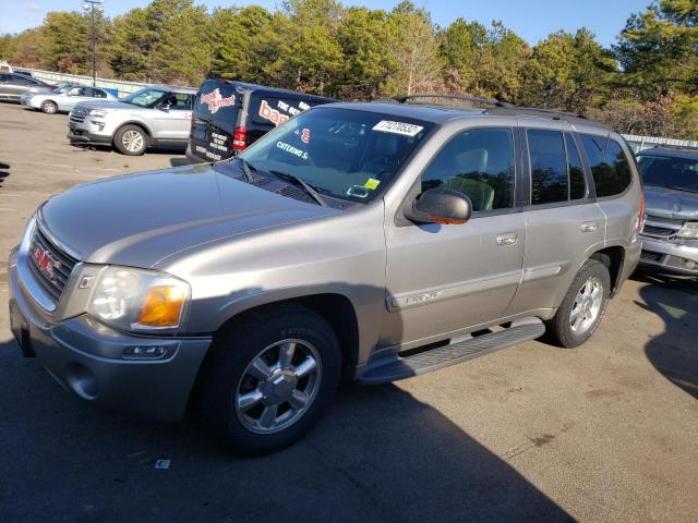 GMC ENVOY 2003 مع رقم تعريف المركبة 1GKDT13S732110326 - صورة من المزاد
