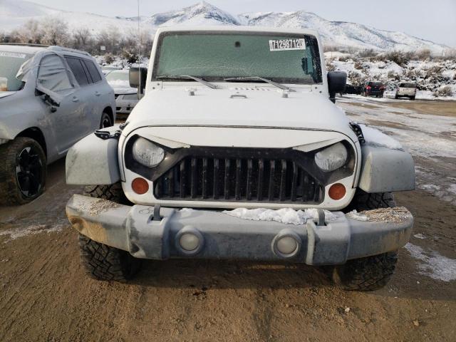 Photo 5 from auction – 2011 JEEP WRANGLER U with VIN 1J4BA6H14BL598904