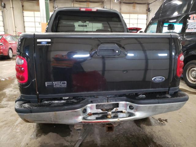 Photo 6 from auction – 2003 FORD F150 SUPER with VIN 1FTRW08L93KD28790