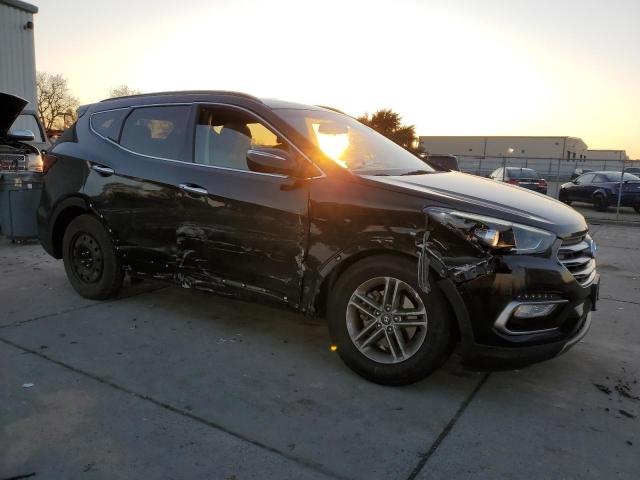 Photo 4 from auction – 2018 HYUNDAI SANTA FE S with VIN 5NMZU3LB9JH068731
