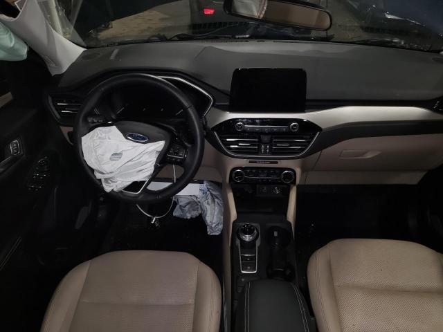 Photo 8 from auction – 2021 FORD ESCAPE SEL with VIN 1FMCU9H96MUA19543