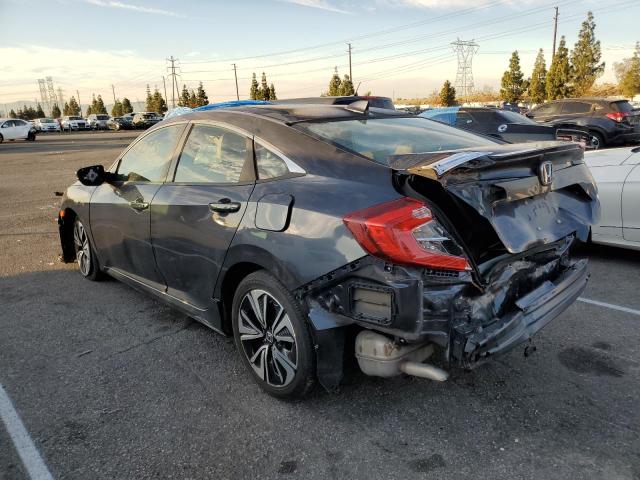 Photo 2 from auction – 2018 HONDA CIVIC EX with VIN JHMFC1F34JX015861