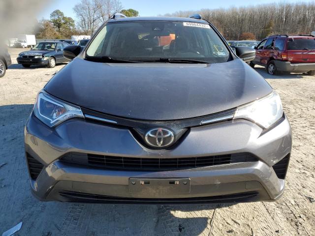 Photo 5 from auction – 2017 TOYOTA RAV4 LE with VIN JTMBFREV9HJ104816