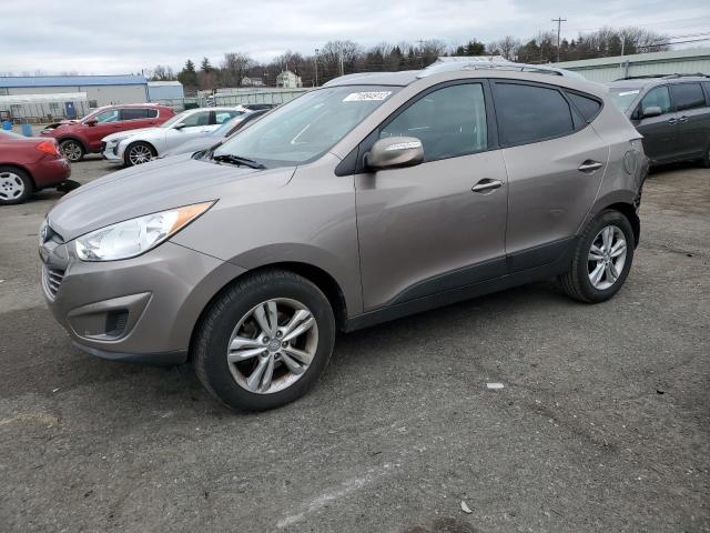 HYUNDAI TUCSON GLS 2012 with VIN KM8JUCAC7CU478900 - Photo from auction