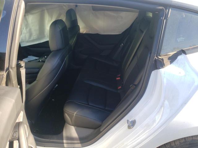 Photo 10 from auction – 2021 TESLA MODEL 3 with VIN 5YJ3E1EB9MF010175