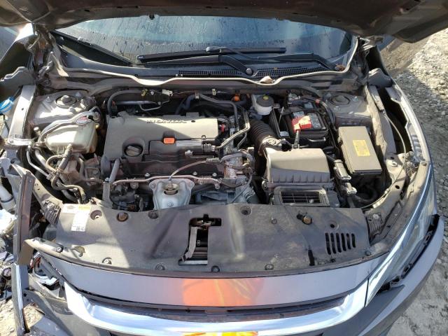 Photo 11 from auction – 2018 HONDA CIVIC LX with VIN 19XFC2F50JE006891
