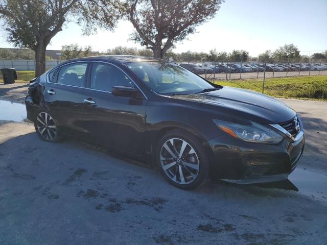 Photo 4 from auction – 2017 NISSAN ALTIMA 2.5 with VIN 1N4AL3AP5HC296206