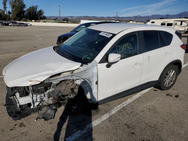 MAZDA CX-5 SPORT 2015 with VIN JM3KE2BE5F0497027 - Photo from auction