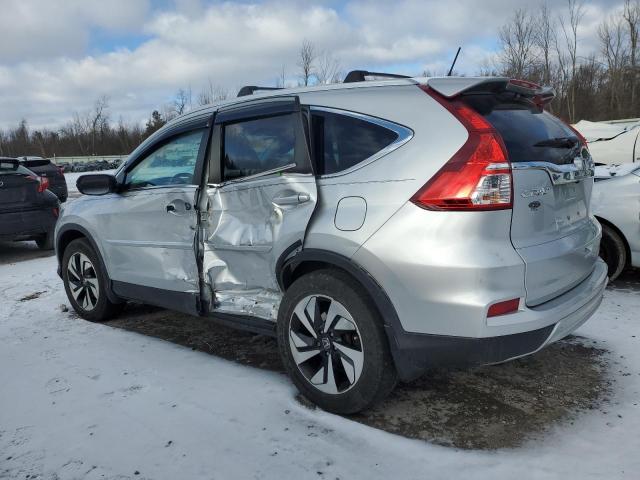 Photo 2 from auction – 2015 HONDA CR-V TOURI with VIN 5J6RM3H97FL010400