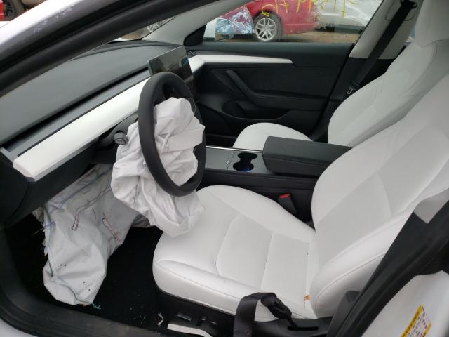 Photo 7 from auction – 2022 TESLA MODEL 3 with VIN 5YJ3E1EA4NF338466
