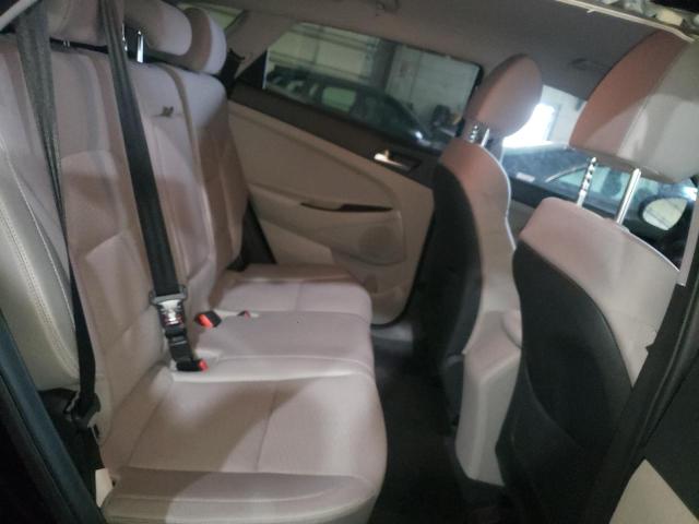 Photo 11 from auction – 2020 HYUNDAI TUCSON LIM with VIN KM8J3CA41LU246109
