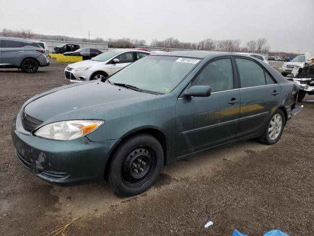 TOYOTA CAMRY LE 2002 with VIN 4T1BF32K72U509923 - Photo from auction