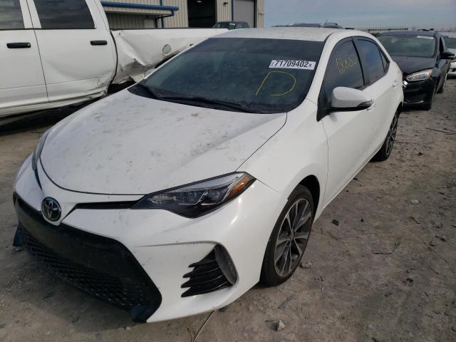TOYOTA COROLLA L 2018 with VIN 2T1BURHE3JC077681 - Photo from auction