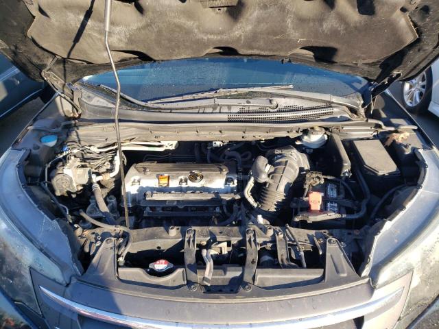 Photo 12 from auction – 2014 HONDA CR-V LX with VIN 2HKRM4H30EH620861