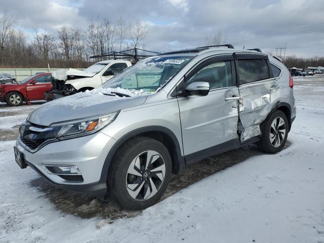 Photo 1 from auction – 2015 HONDA CR-V TOURI with VIN 5J6RM3H97FL010400