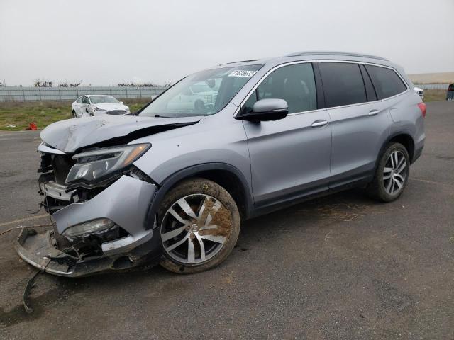HONDA PILOT TOUR 2016 with VIN 5FNYF5H99GB047282 - Photo from auction