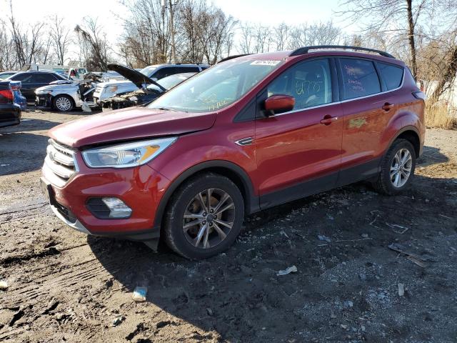 FORD ESCAPE SE 2018 with VIN 1FMCU9GD5JUC00683 - Photo from auction