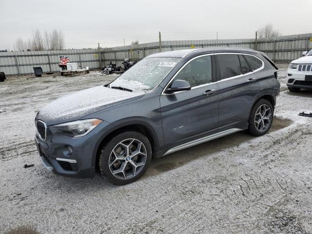 BMW X1 XDRIVE2 2017 with VIN WBXHT3C3XH5F87345 - Photo from auction