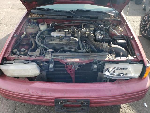 Photo 11 from auction – 1995 FORD ESCORT LX with VIN 1FASP11J8SW379496