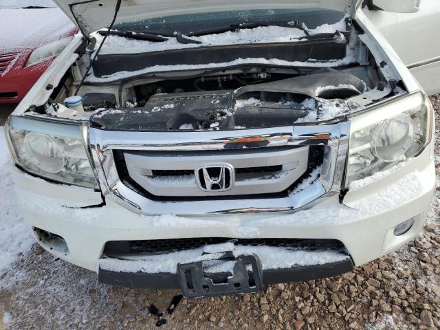 Photo 12 from auction – 2011 HONDA PILOT TOUR with VIN 5FNYF4H93BB049161