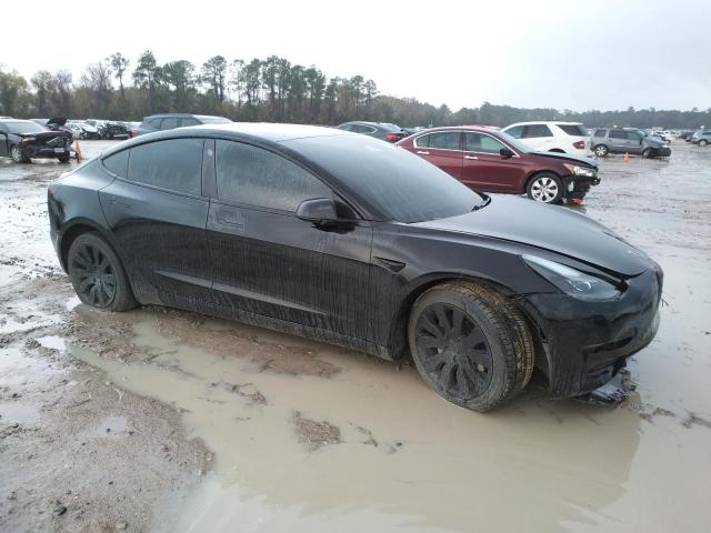 Photo 4 from auction – 2021 TESLA MODEL 3 with VIN 5YJ3E1EB4MF055881
