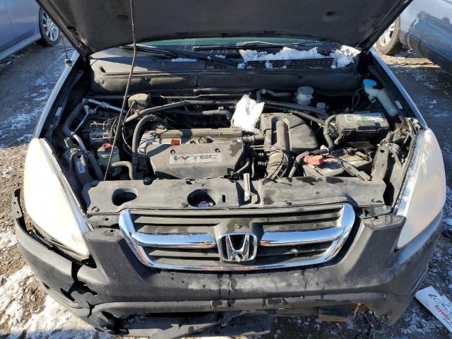Photo 11 from auction – 2002 HONDA CR-V LX with VIN JHLRD77422C804964