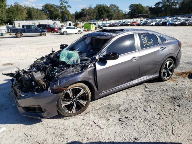 HONDA CIVIC TOUR 2016 with VIN 19XFC1F97GE019207 - Photo from auction