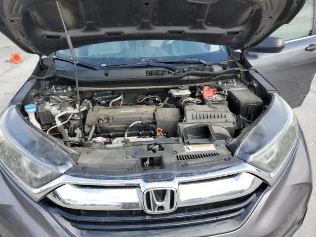Photo 12 from auction – 2017 HONDA CR-V LX with VIN 7FARW5H38HE007653