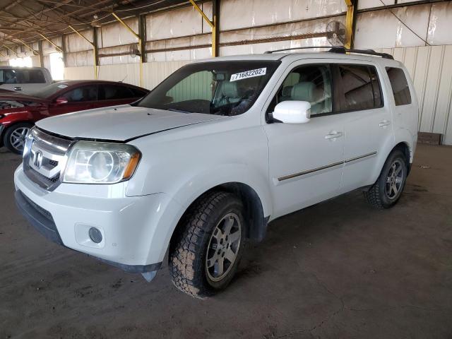 HONDA PILOT TOUR 2010 with VIN 5FNYF4H95AB030738 - Photo from auction
