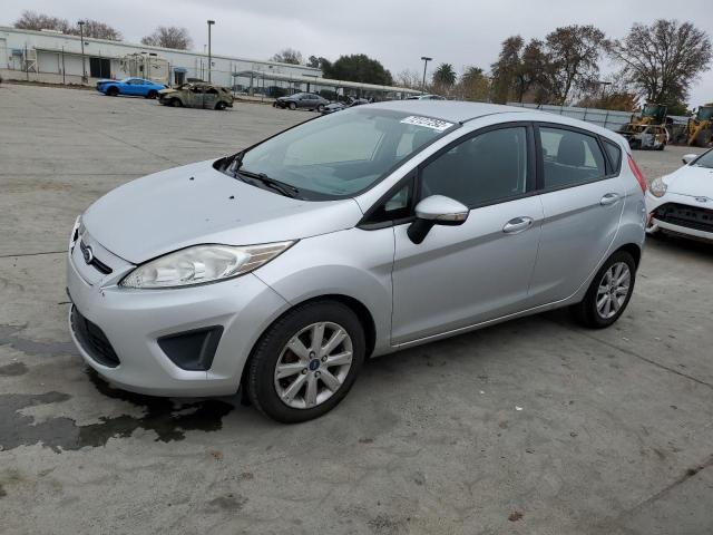 FORD FIESTA SE 2013 with VIN 3FADP4EJ1DM221279 - Photo from auction