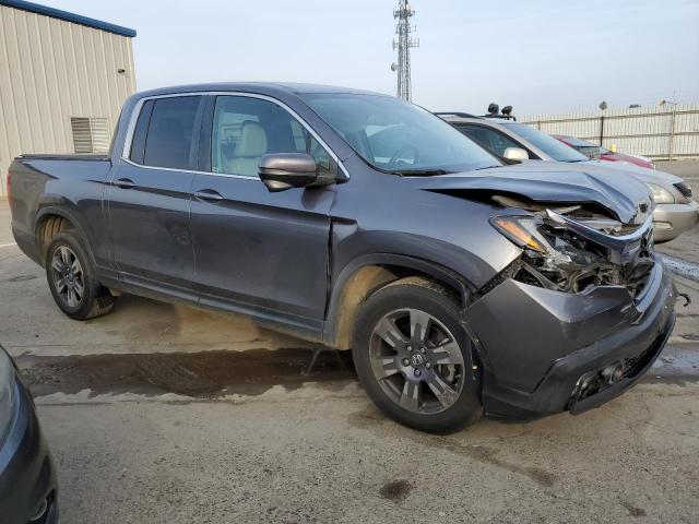 Photo 4 from auction – 2017 HONDA RIDGELINE with VIN 5FPYK2F61HB006883