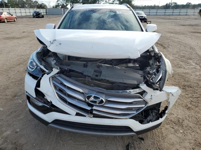 Photo 5 from auction – 2017 HYUNDAI SANTA FE S with VIN 5NMZU3LB4HH006227