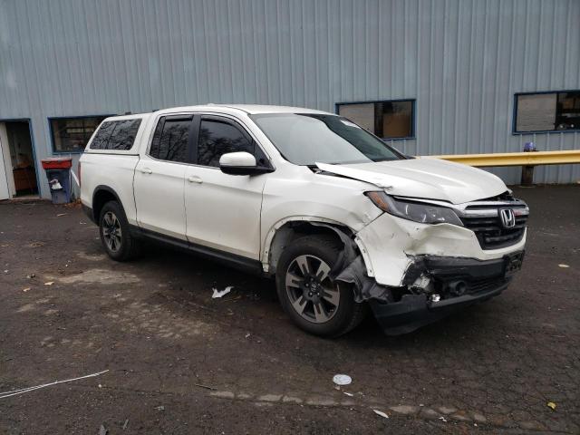 Photo 4 from auction – 2017 HONDA RIDGELINE with VIN 5FPYK3F52HB011099
