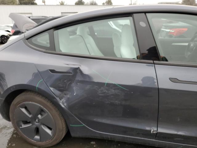 Photo 10 from auction – 2022 TESLA MODEL 3 with VIN 5YJ3E1EB3NF308609