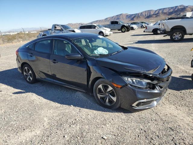 Photo 4 from auction – 2019 HONDA CIVIC LX with VIN 19XFC2F65KE041307