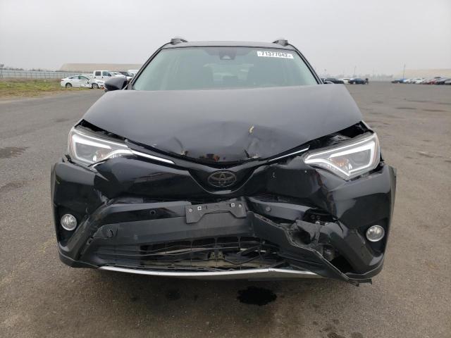 Photo 5 from auction – 2016 TOYOTA RAV4 LIMIT with VIN 2T3DFREV1GW515653