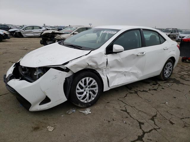 TOYOTA COROLLA L 2019 with VIN 5YFBURHE2KP939595 - Photo from auction