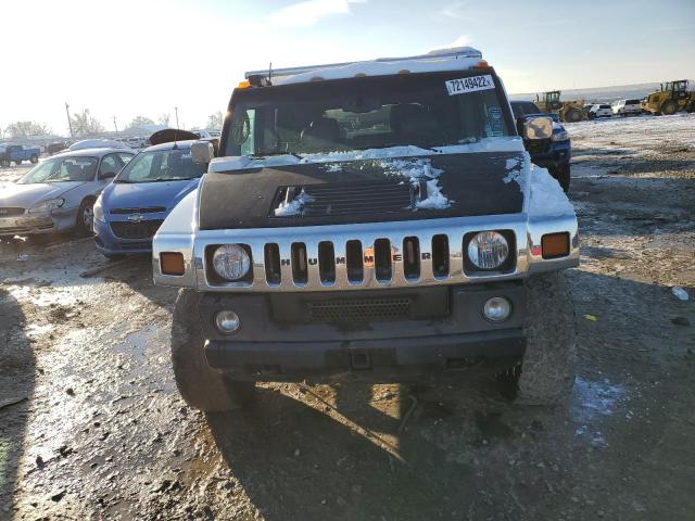 Photo 5 from auction – 2003 HUMMER H2 with VIN 5GRGN23U43H139093