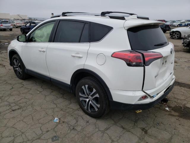 Photo 2 from auction – 2018 TOYOTA RAV4 LE with VIN JTMZFREV0JJ172457