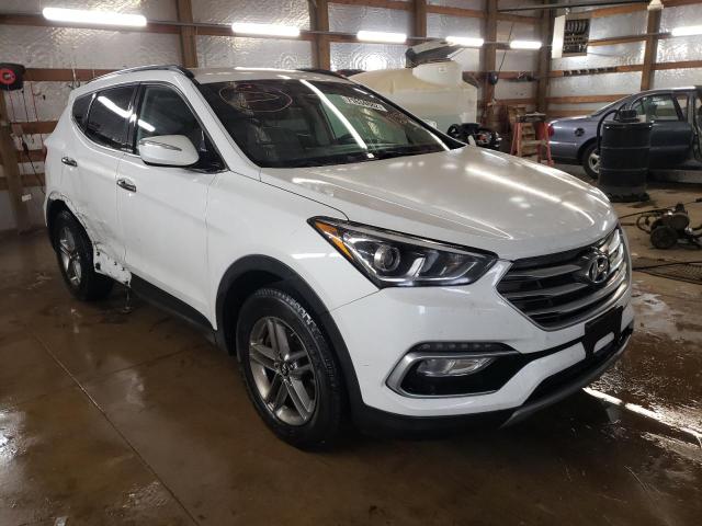 Photo 4 from auction – 2018 HYUNDAI SANTA FE S with VIN 5NMZU3LB7JH101659