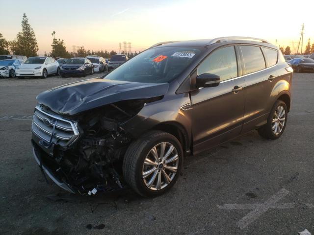 FORD ESCAPE TIT 2017 with VIN 1FMCU0J93HUC14012 - Photo from auction