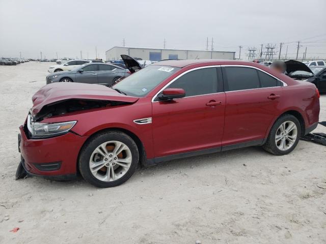 FORD TAURUS SEL 2016 with VIN 1FAHP2E8XGG128066 - Photo from auction