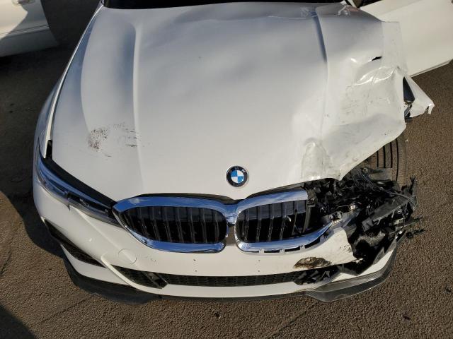 Photo 11 from auction – 2021 BMW 330XI with VIN 3MW5R7J09M8C03108