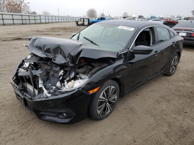 HONDA CIVIC EX 2018 with VIN 19XFC1F39JE201476 - Photo from auction