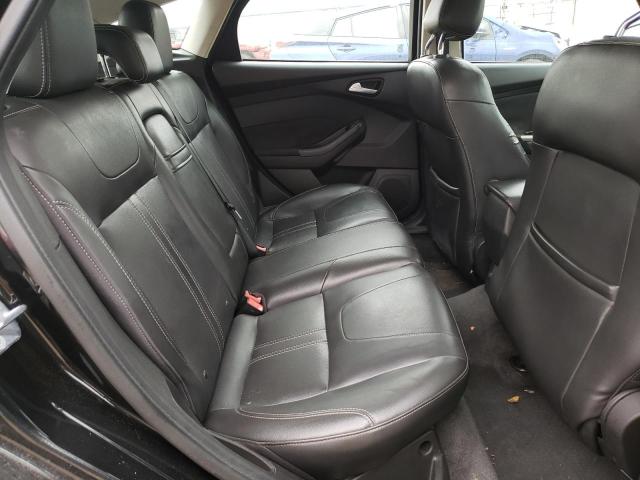 Photo 10 from auction – 2012 FORD FOCUS SEL with VIN 1FAHP3M2XCL120554
