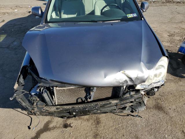 Photo 11 from auction – 2006 KIA OPTIMA LX with VIN KNAGE124465074522