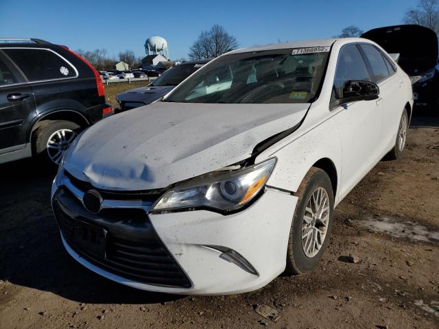 TOYOTA CAMRY LE 2016 with VIN 4T4BF1FK7GR569857 - Photo from auction