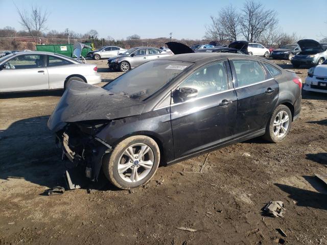 FORD FOCUS SE 2014 with VIN 1FADP3F24EL152401 - Photo from auction